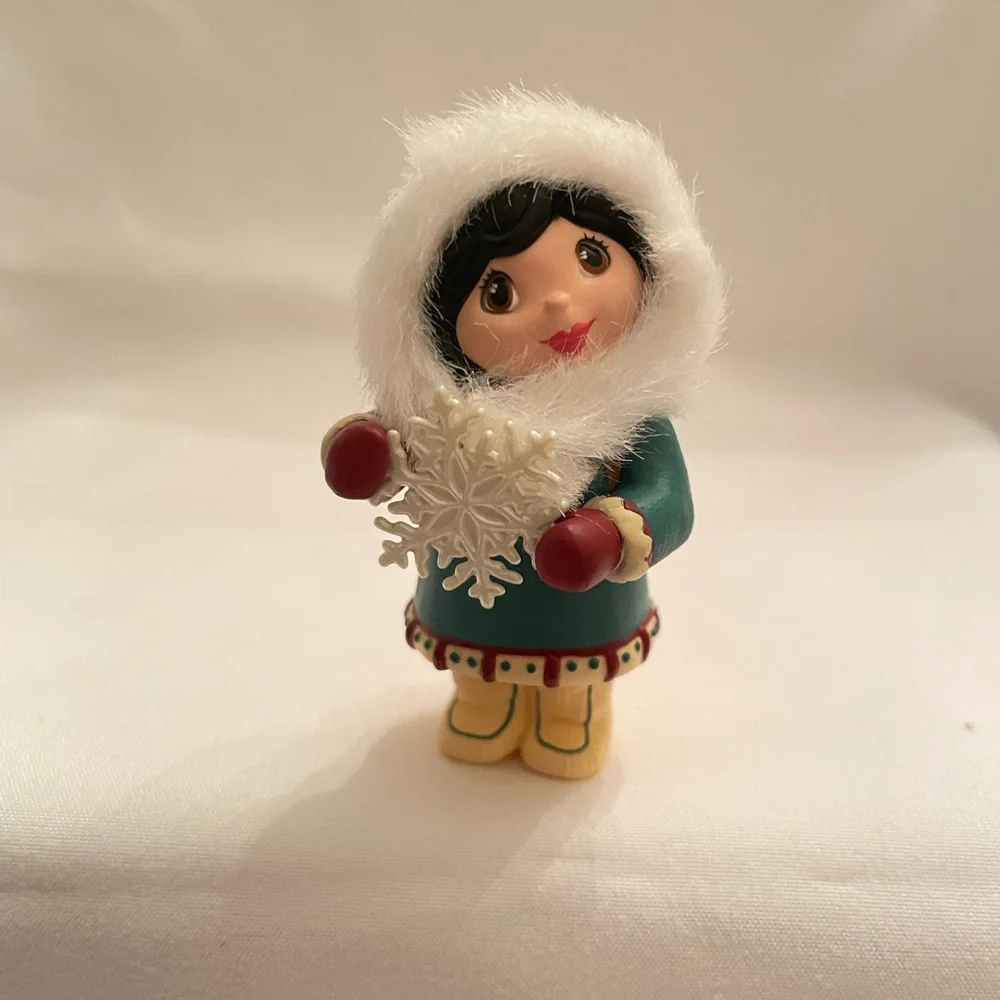 Hallmark Ornament - Girl in Teal and White with Red Accents. EUC in original box